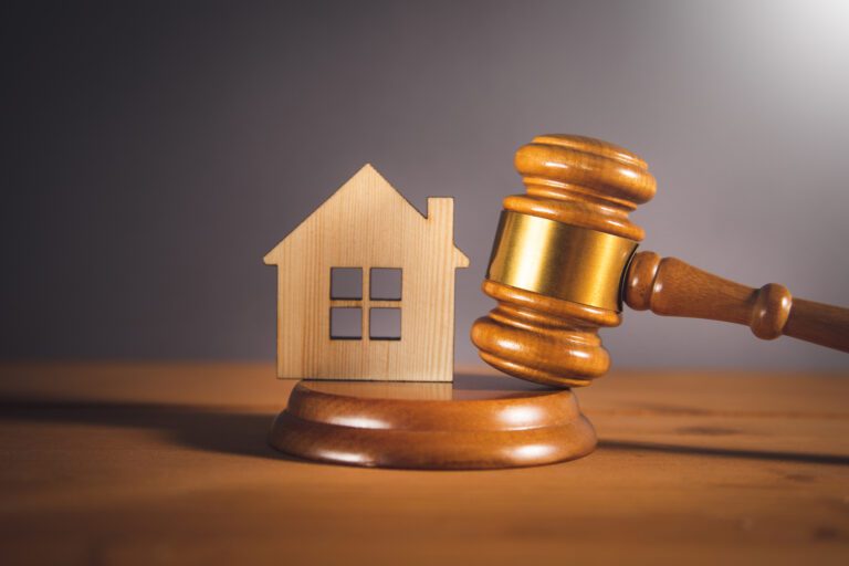 Law concept, Wooden judge hammer and house model